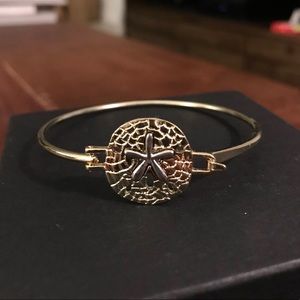 Gold sand dollar bracelet